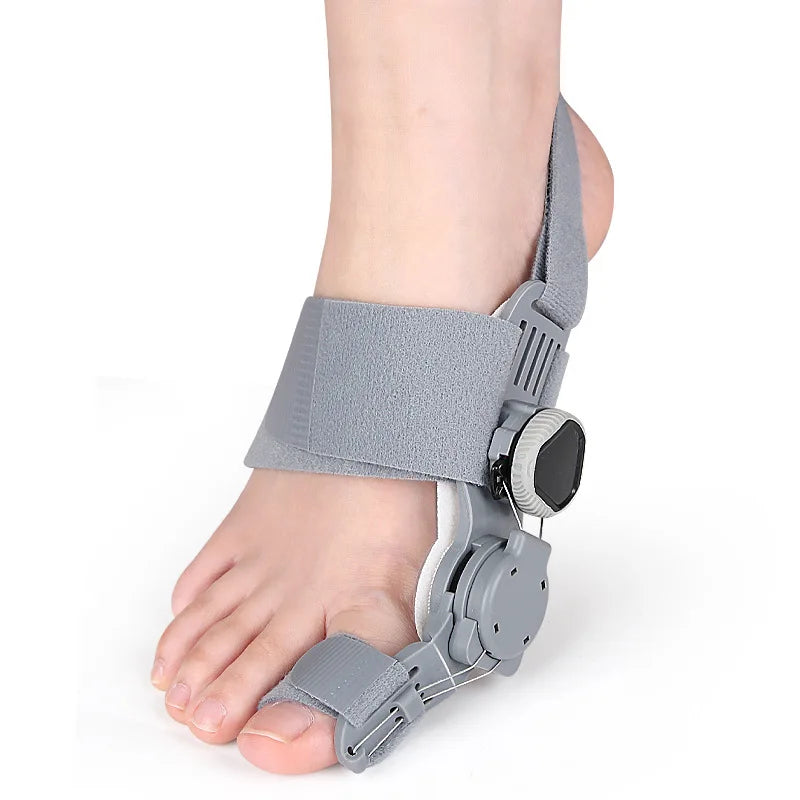 Adjustable bunion relief splint with rotatable hinge, shown on foot