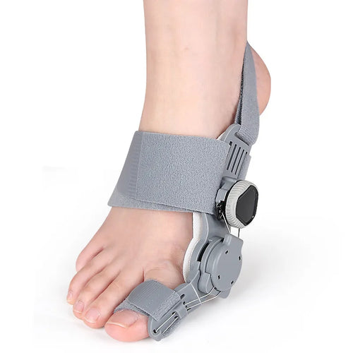 Adjustable bunion relief splint with rotatable hinge, shown on foot